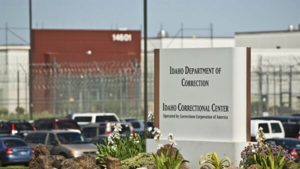 sign in front of prison that reads "Idaho Department of Correction Idaho Correctional Center"