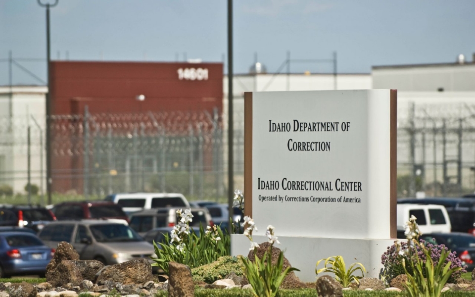 sign in front of prison that reads "Idaho Department of Correction Idaho Correctional Center"