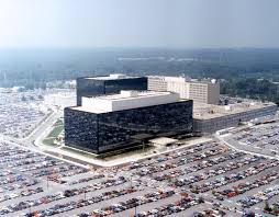 The NSA building from a distance, shown with parking lots surrounding it.