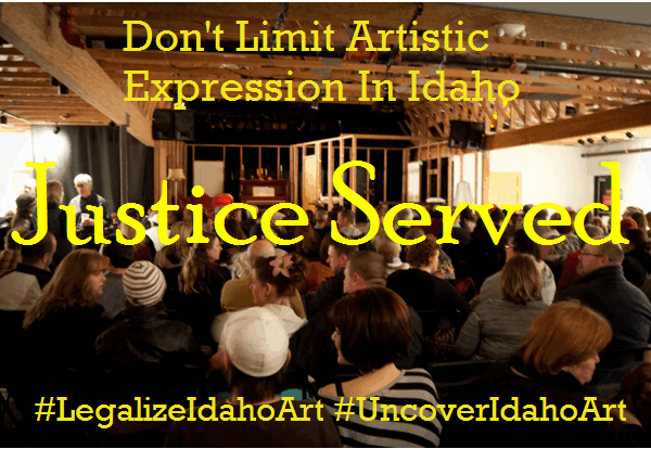 a venue with people sitting and waiting for the show to start from the back of the room, with words "Don't limit Artistic Expression in Idaho" "Justice Served" "#legalizeidahoart" and "#uncoveridahoart"