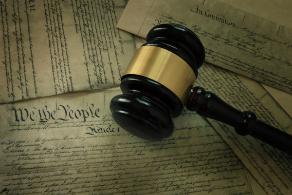 Judge's gavel on top of the U.S. Constitution