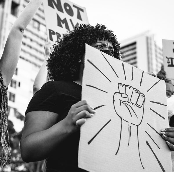 Black lives matter international activist movement protesting against racism and fighting for justice - Demonstrators from different cultures and race protest on street for equal rights