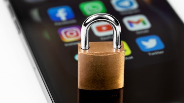 A smartphone with social media icons blocked by a padlock