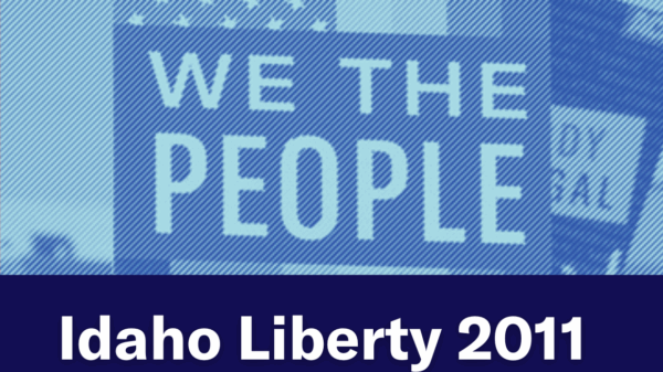 A blue image of a person holding a "We The People" sign. Text below the image reads "Idaho Liberty 2011"