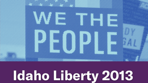 A blue image of a person holding a "We The People" sign. Text below the image reads "Idaho Liberty 2013"