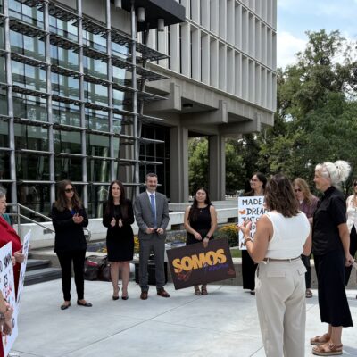 Advocates and lawyers gather outside the Idaho Federal Courthouse in solidarity with immigrants ahead of lawsuit hearing