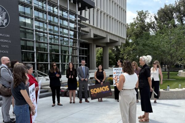 Advocates and lawyers gather outside the Idaho Federal Courthouse in solidarity with immigrants ahead of lawsuit hearing