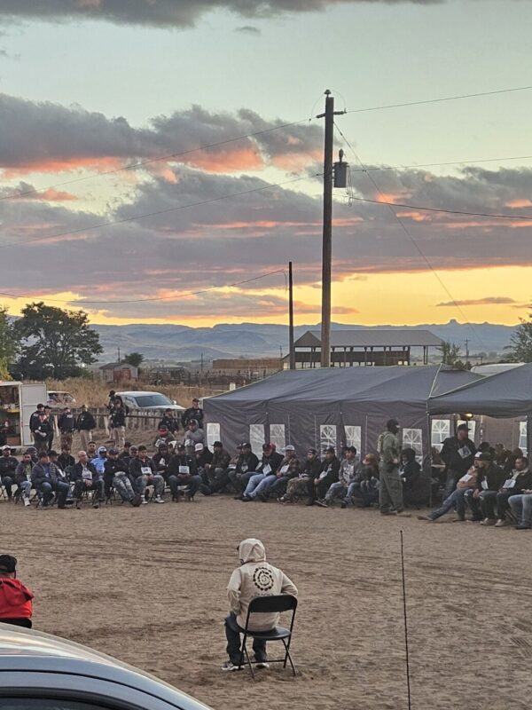 Image of people being questioned by immigration agents in Wilder, Idaho