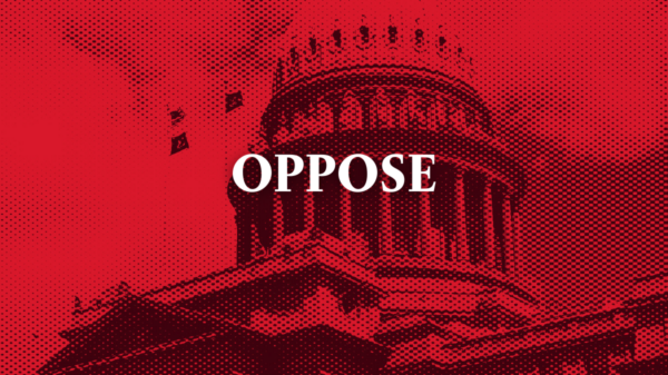 Red image of the Idaho capitol with text "oppose"