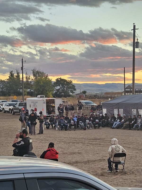 A large number of community members are detained and questioned by law enforcement in Wilder, Idaho.