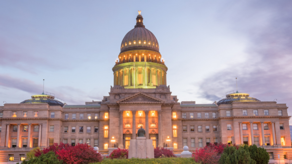 Front of the Idaho capitol lit up at dusk
