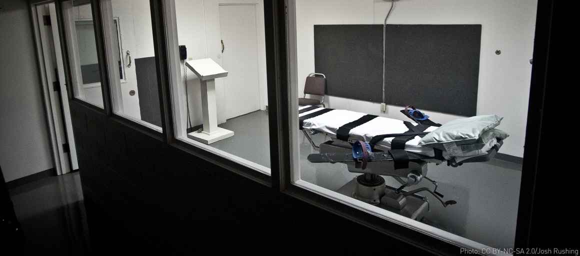 Empty lethal injection execution chamber with injection table and podium