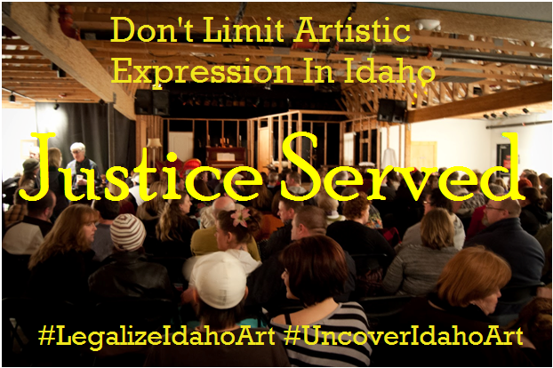 a venue with people sitting and waiting for the show to start from the back of the room, with words "Don't limit Artistic Expression in Idaho" "Justice Served" "#legalizeidahoart" and "#uncoveridahoart"